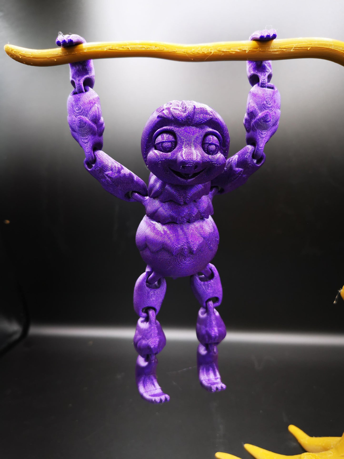 Cute Flexi Sloth fidget Desk toy with decorative tree branch