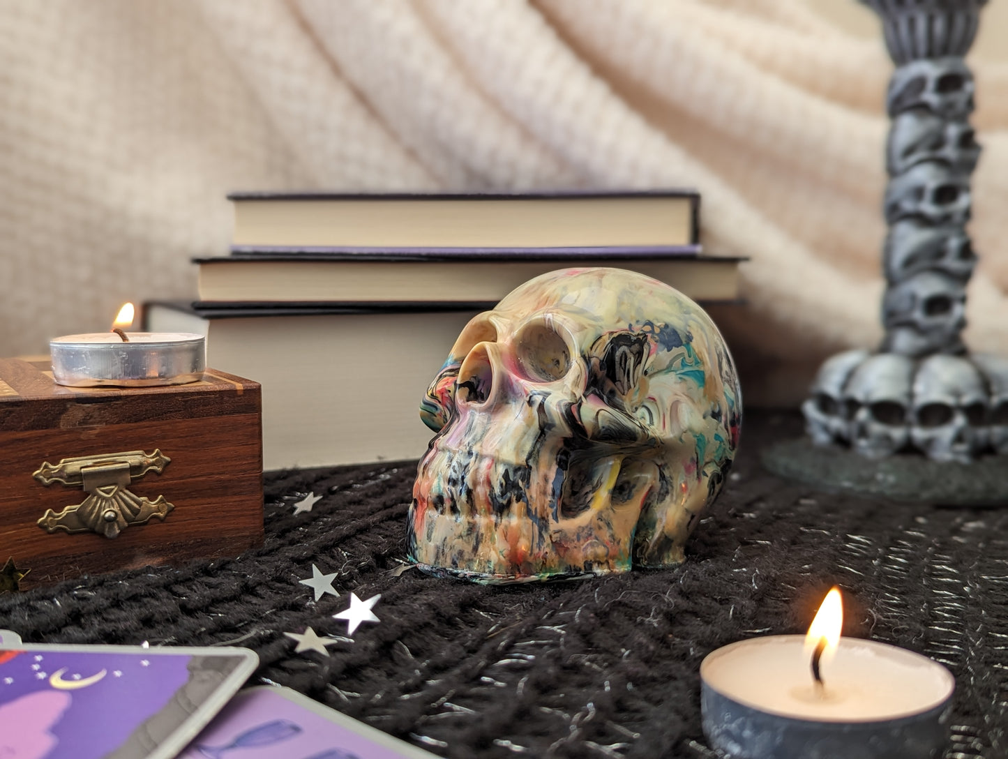 Marbled skull ornament from 3D printer waste close up from side angle
