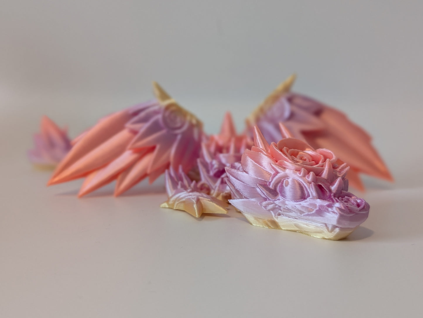 Winged Rose Dragon – Articulated fidget toy in various multi-tone colours