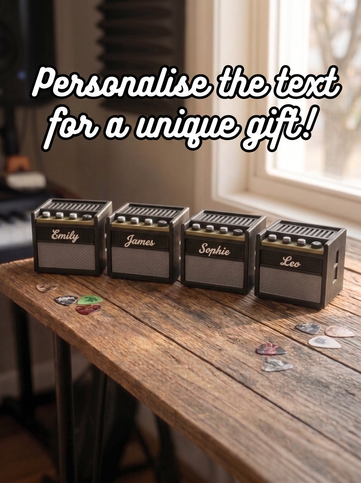 Four mini guitar amps personalised with the names Emily, James, Sophie and Leo