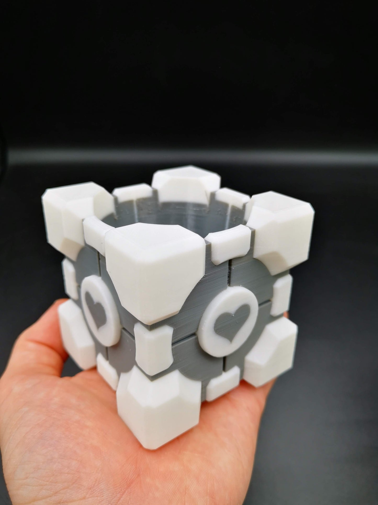 Small Companion Cube Portal planter close up in hand