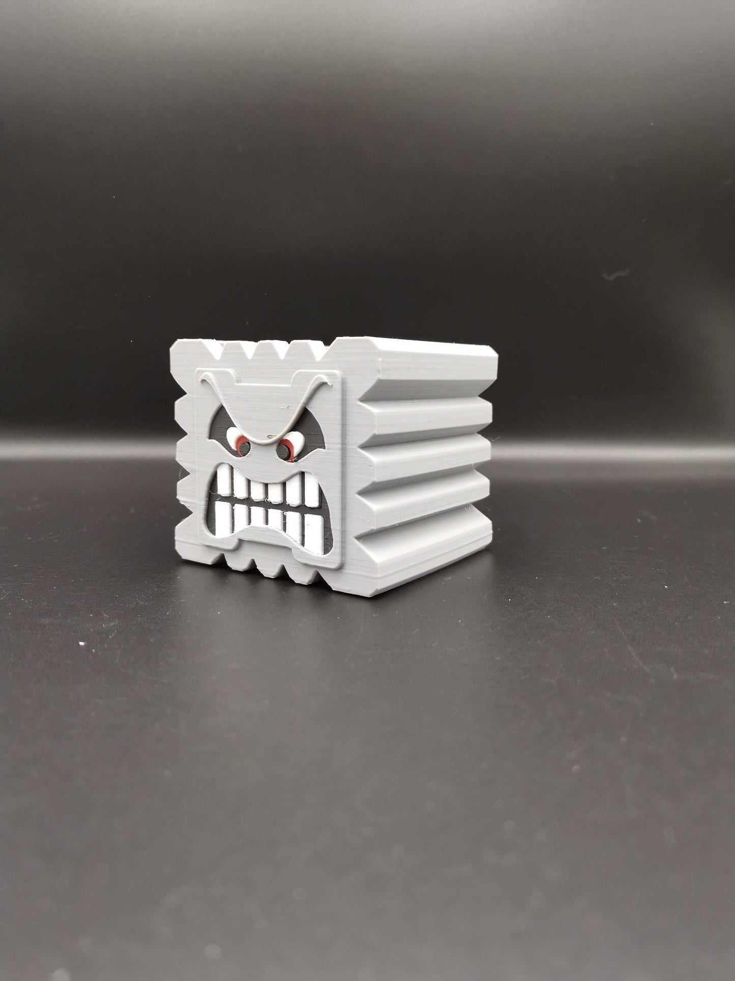 Thwomp Mario planter without plant at an angle