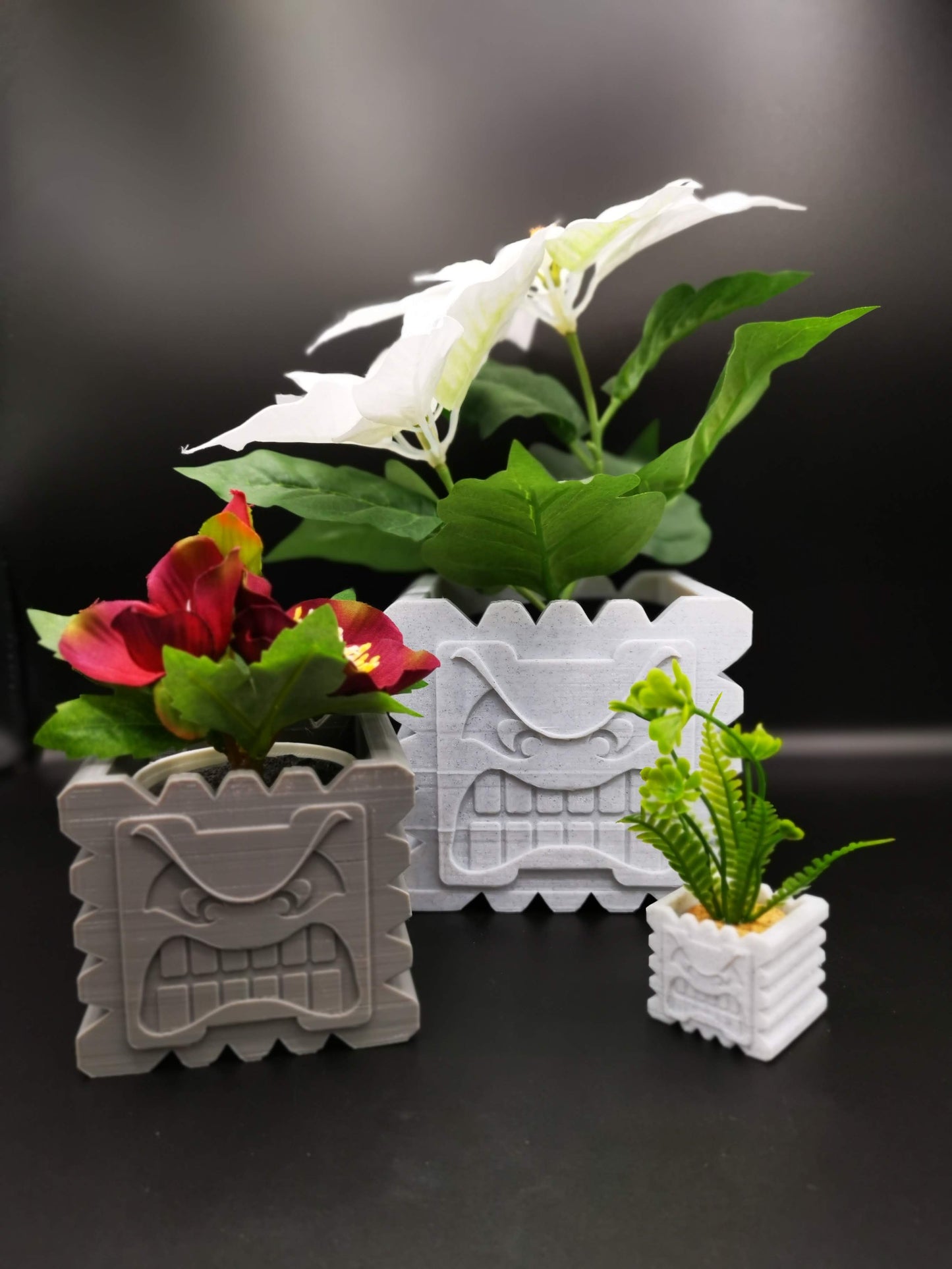 Thwomp planters in various sizes