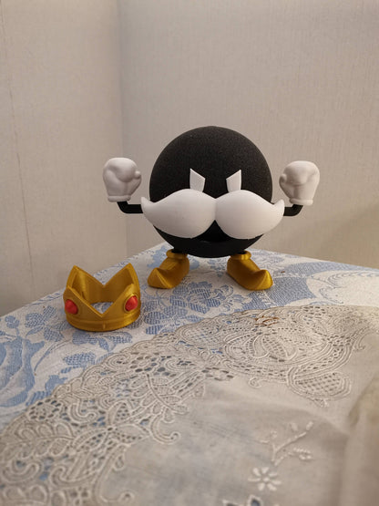 Bomb-omb Alexa Echo holder with crown next to it