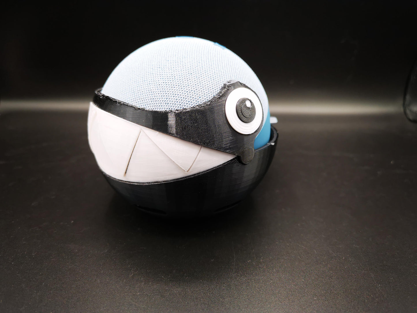 Chain Chomp Alexa Echo holder from a front side angle close up