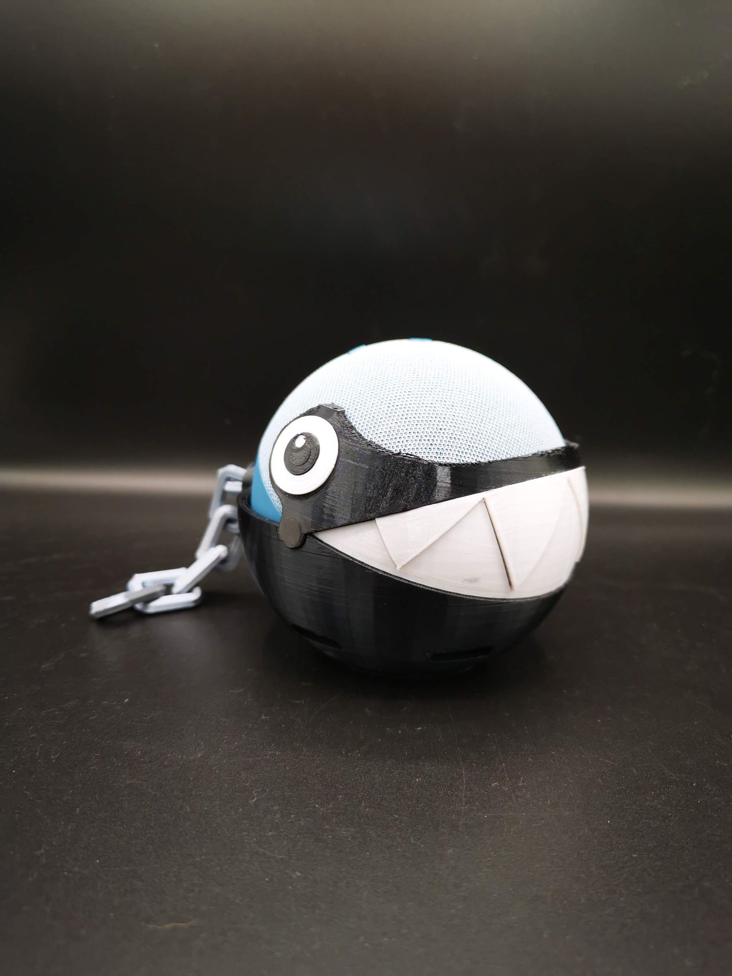Chain Chomp Alexa Echo holder from a front side angle with mouth closed