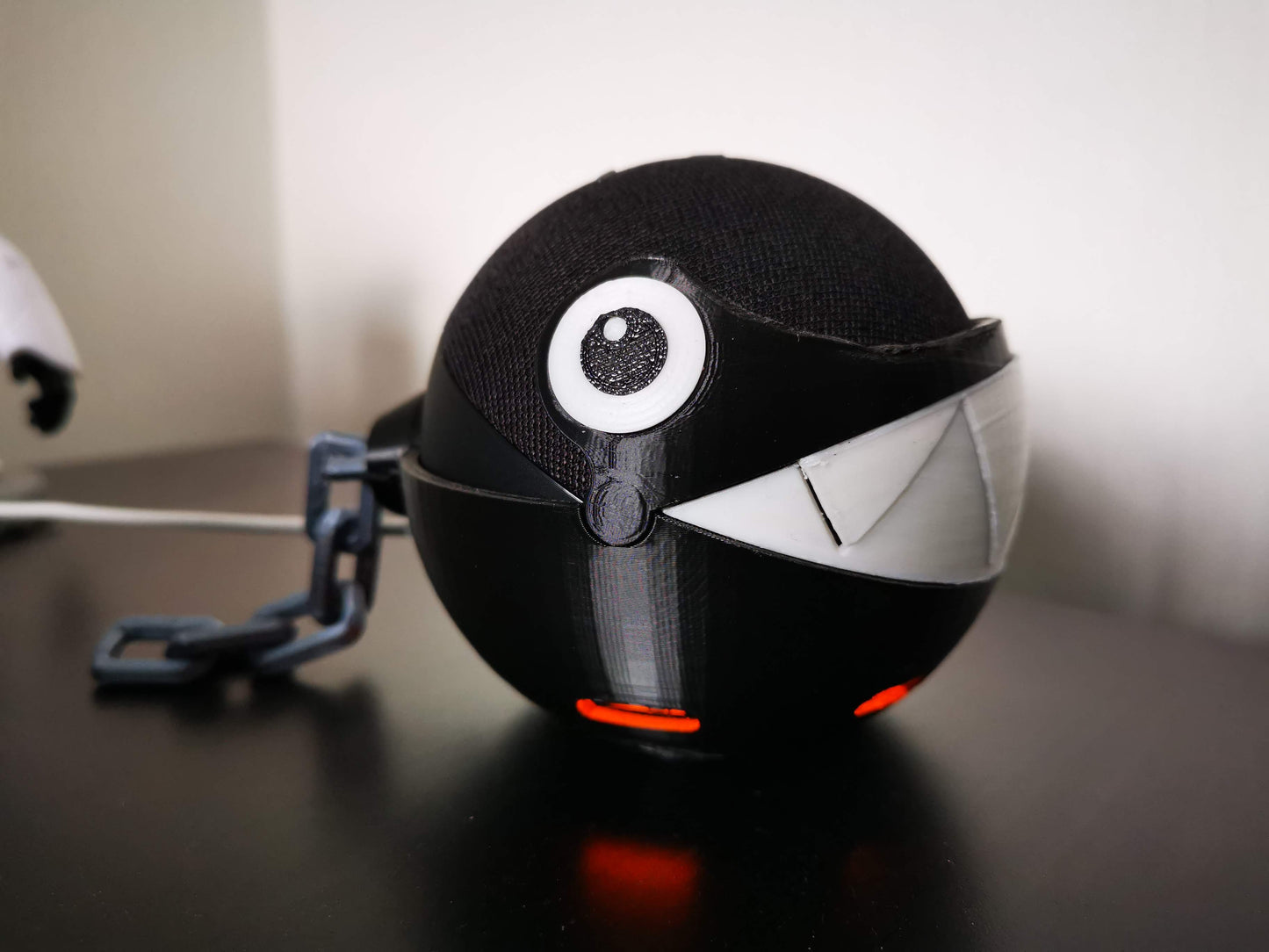 Chain Chomp Alexa Echo holder with teeth closed from the side close up