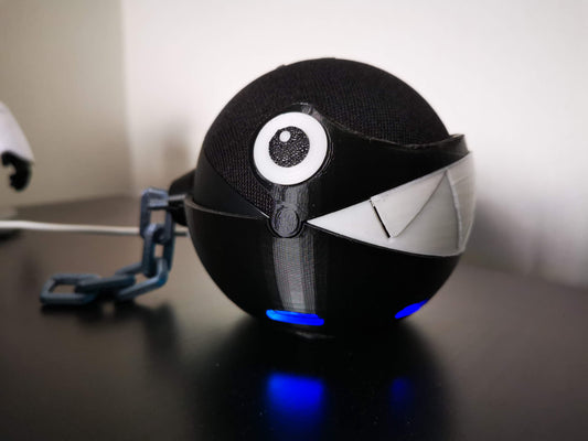 Chain Chomp Alexa Echo holder with teeth closed from the side with Alexa lights on