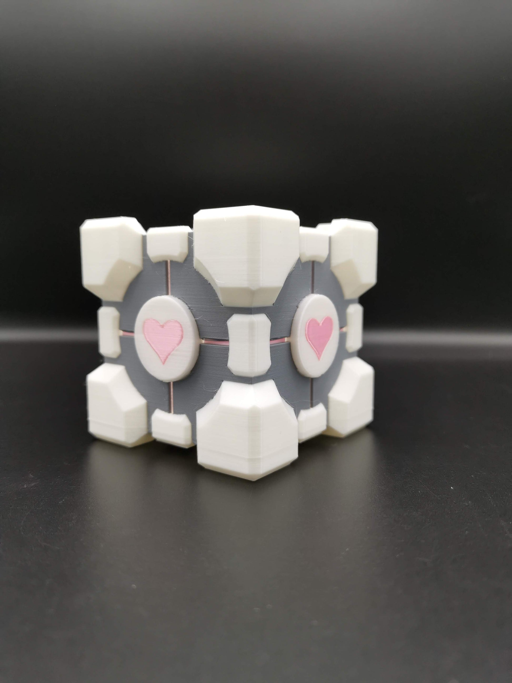 Companion Cube Portal planter close up from front side angle