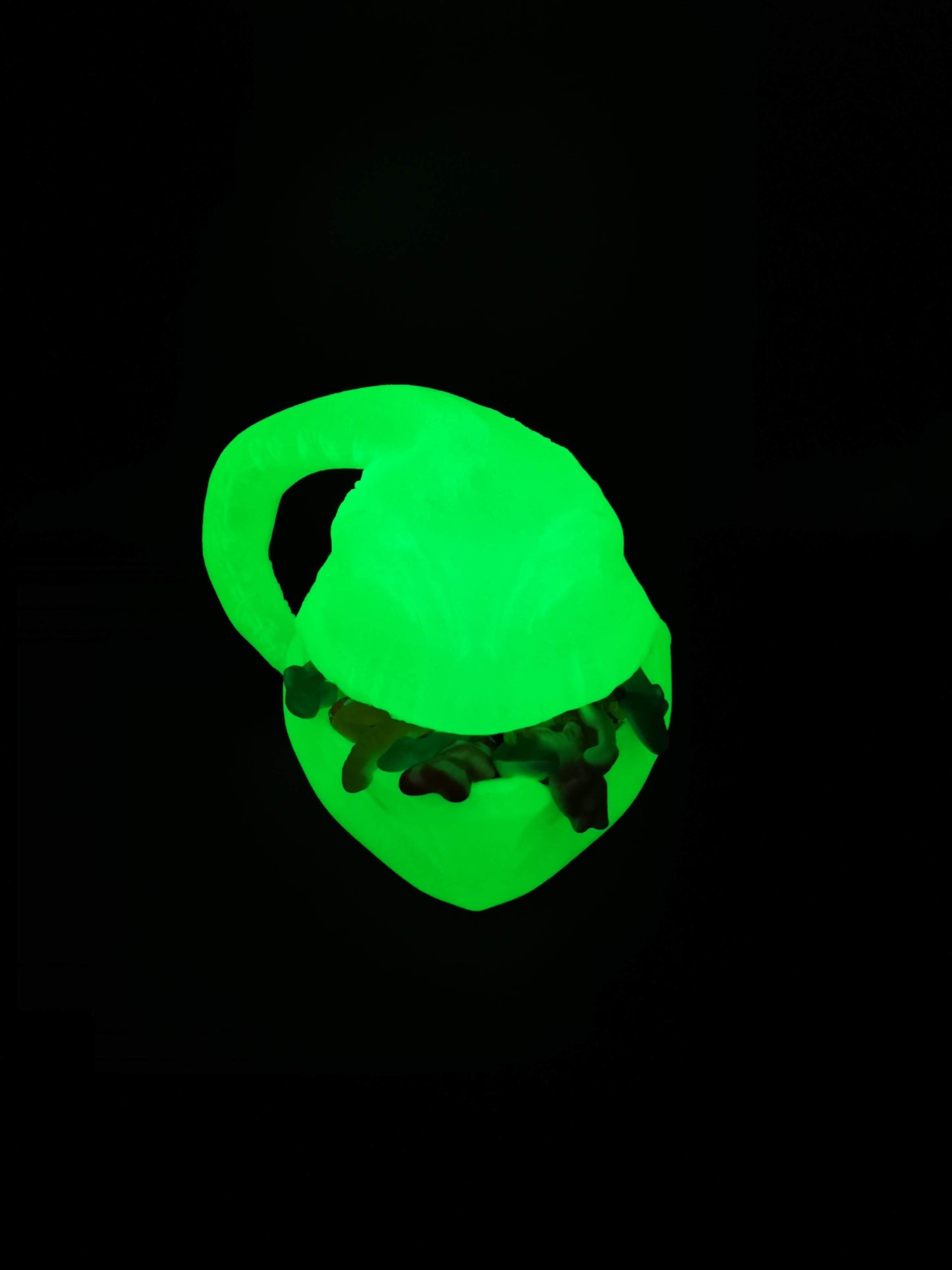 Glow in the dark Oogie Boogie candy bowl with candy in mouth