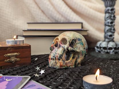 Marbled skull ornament from 3D printer waste close up from side angle