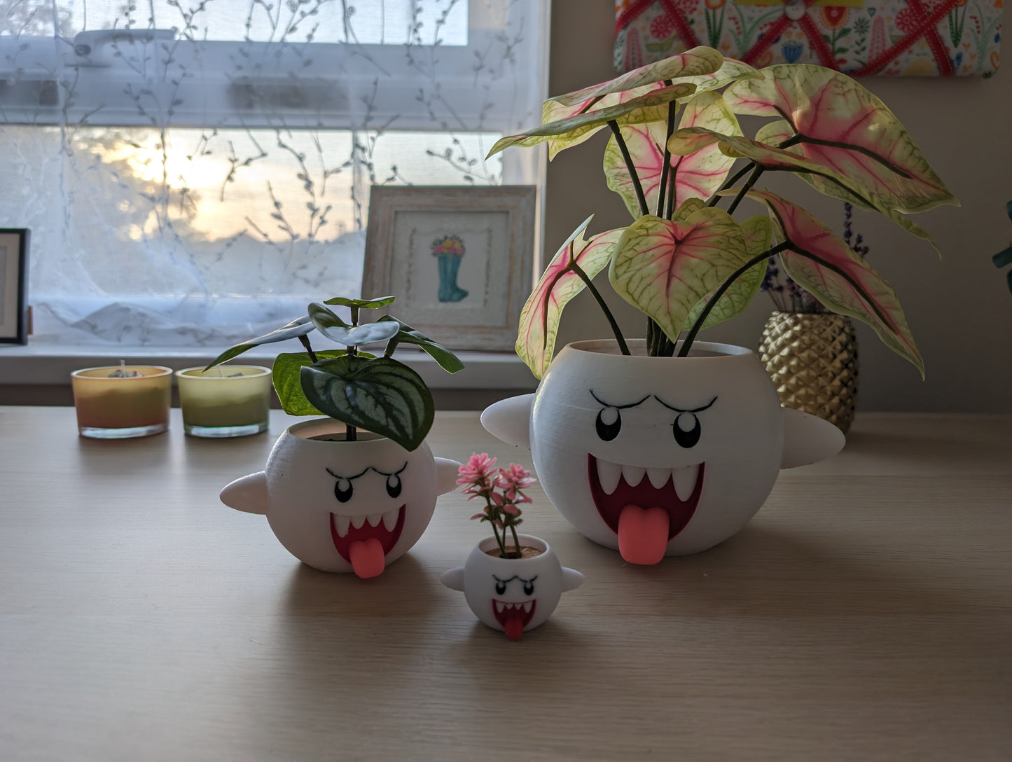Mario Boo planters in various sizes on a desk
