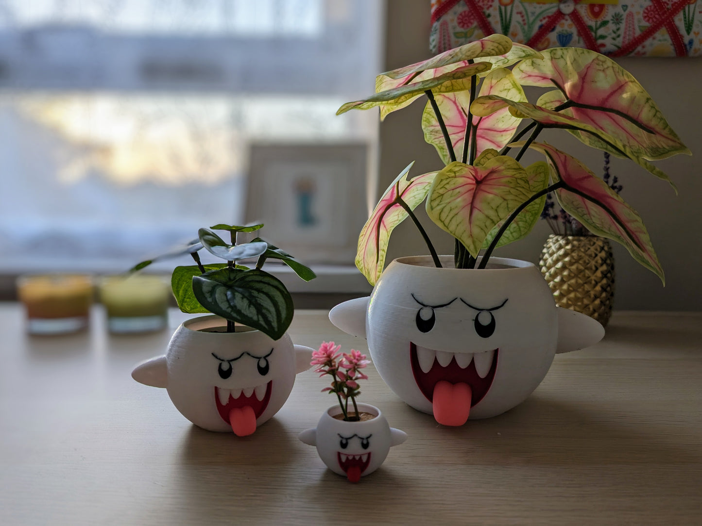 Mario Boo planters in various sizes on desk close up
