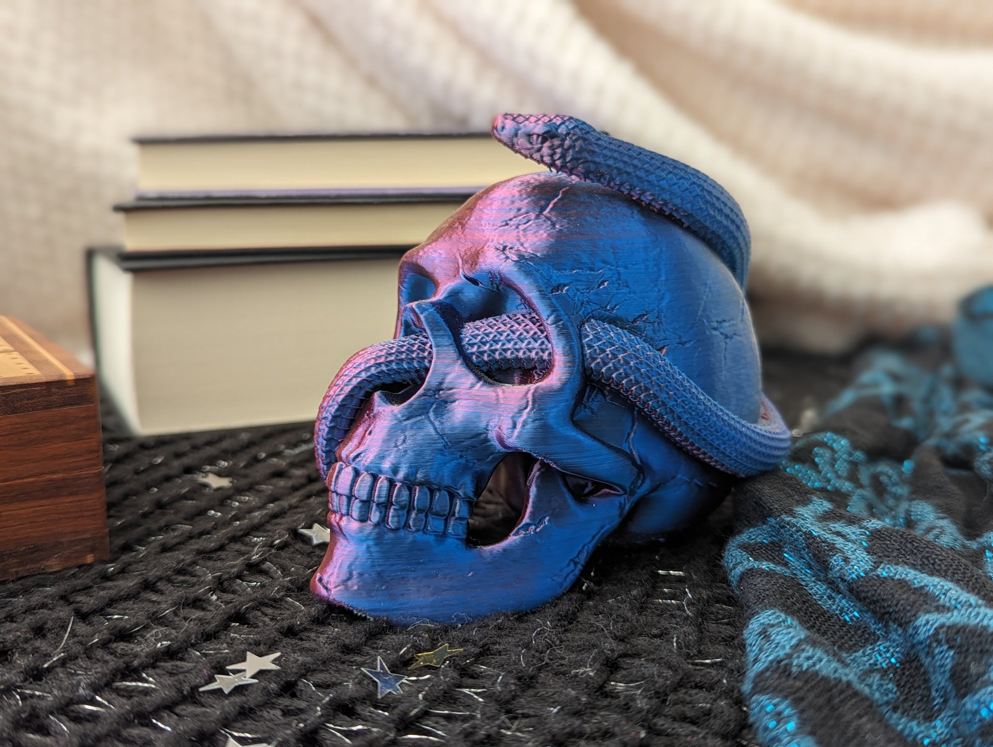 Skull ornament with entwined snake in pink and blue 2-tone