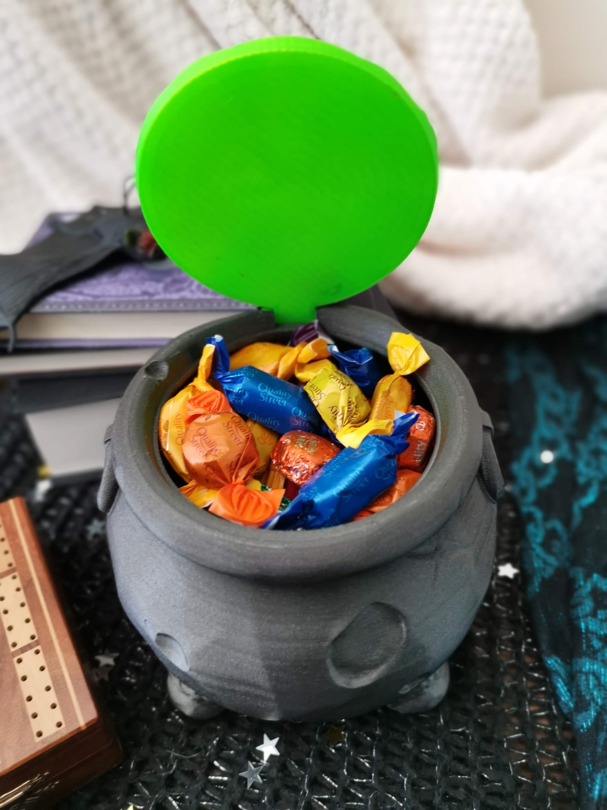 Witches cauldron with candy inside