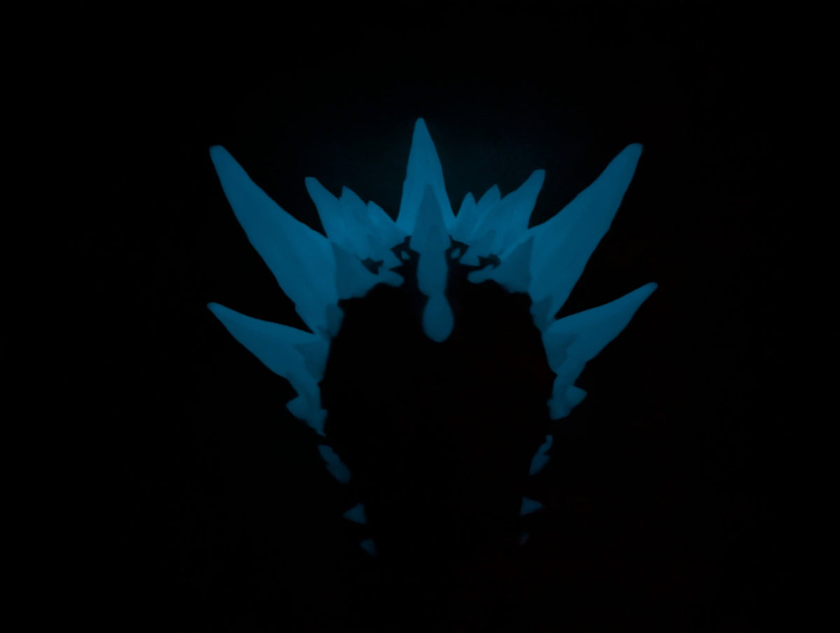 Dragon skull crystals glowing blue in the dark