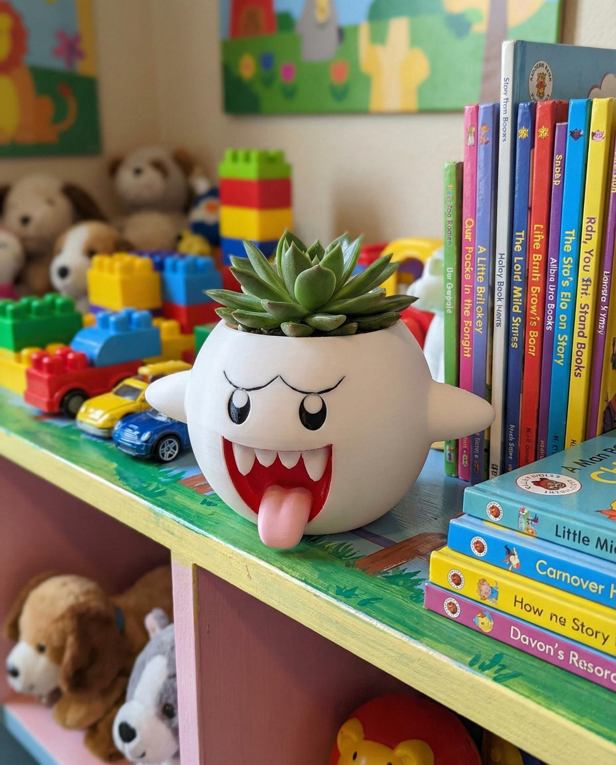 Mario Boo plant pot on a kids bedroom bookshelf
