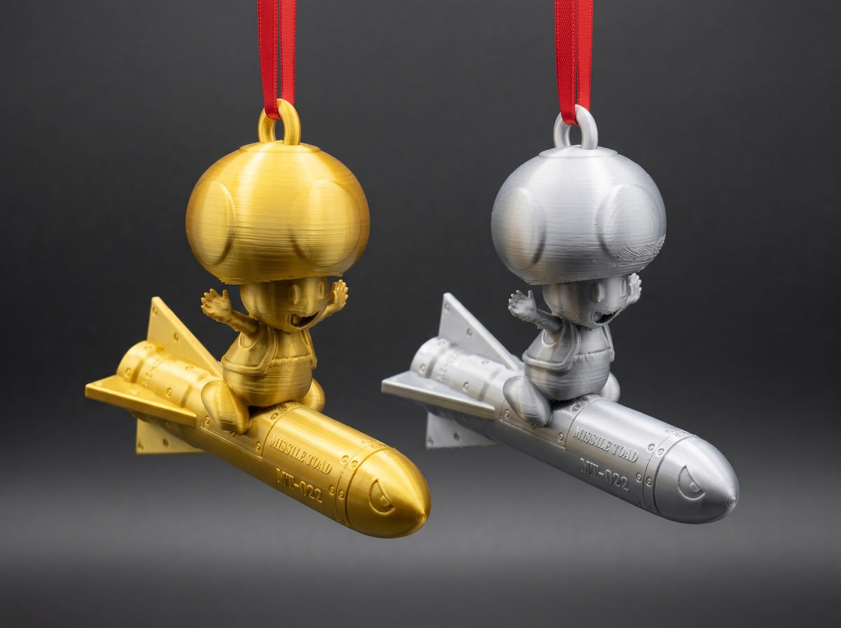 Gold and silver Mario Missile Toads side by side