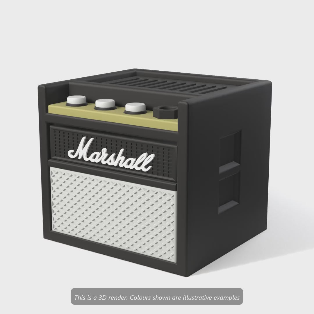 Mini guitar amp pick holder turning round, then picks dropping into the top and the drawer opening
