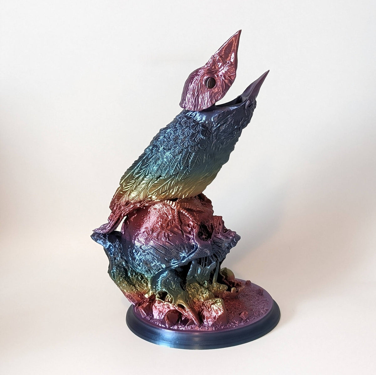Single colour raven dice tower in rainbow silk, side view